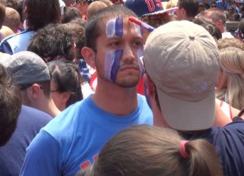 America- kansas city man gets his face painted inside the crowed World Cup 2014 USA vs Belgium